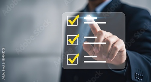 Businessman interacting with a digital checklist on a transparent screen