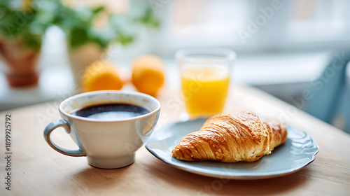 Breakfast Table with Coffee and Croissant