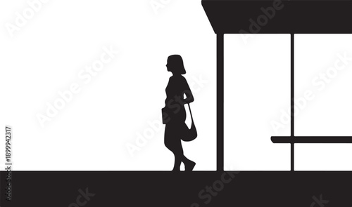 Silhouette of a Woman Walking with a Bag Near a Building