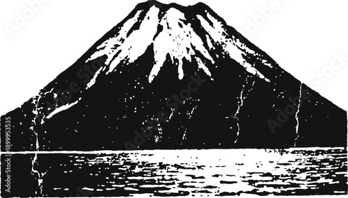 black and white silhouette of a snow capped mountain reflected on water with textured vintage