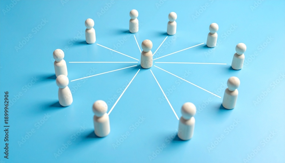 Obraz premium Centralized Network of Wooden Peg Dolls on a Blue Background Representing Strategic Leadership