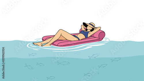 Young woman relaxing on a pink inflatable mattress in the middle of a clear blue sea with small fish swimming beneath the surface.