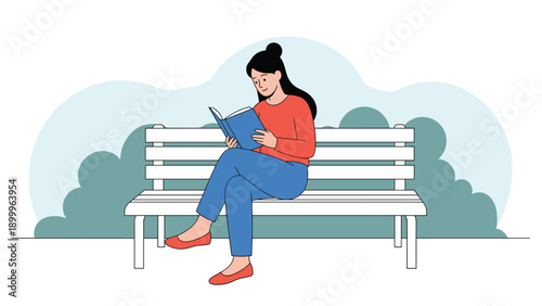Young woman in a red sweater and blue pants sitting comfortably on a white wooden park bench while absorbed in reading a blue book.