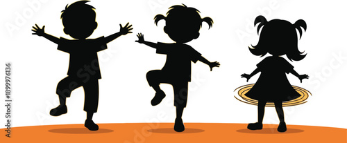Silhouettes of happy children playing and jumping together outdoors