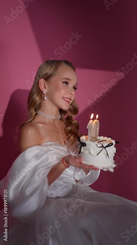 Wallpaper Mural Teenage girl holding a birthday cake with flowers. Birthday celebration concept. Torontodigital.ca