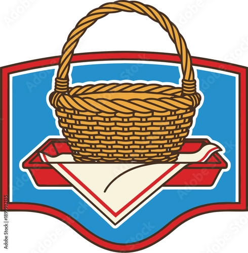 Woven picnic basket sits atop a red rectangular tray with a white napkin emblem.
