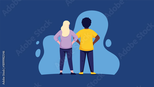 Two people, one blonde woman and one black man, standing side-by-side with their hands on their hips and backs to the viewer, symbolizing partnership or confidence.