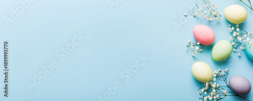 Wallpaper Mural Happy Easter composition. Easter eggs on colored table with gypsophila. Natural dyed colorful eggs background top view with copy space Torontodigital.ca