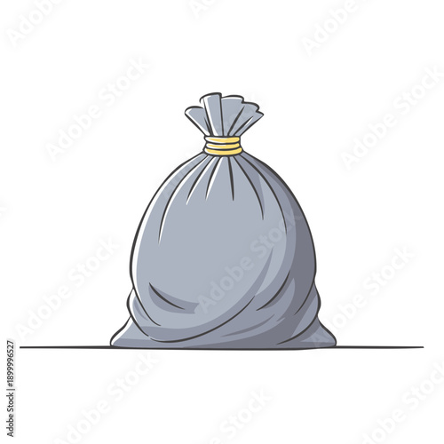 Heavy gray garbage bag tied with yellow string full of contents on a flat surface