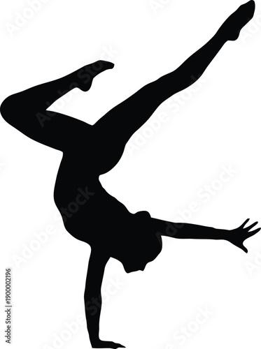 Silhouette of gymnast performing handstand against vibrant blue background