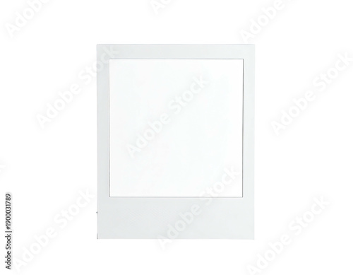 A simple, isolated, slightly angled, white instant photo frame against a stark black background