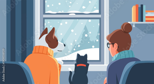 Cozy scene of a dog, cat, and person watching snow fall through a window