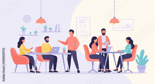 Diverse team collaborating in a modern office with laptops and plants