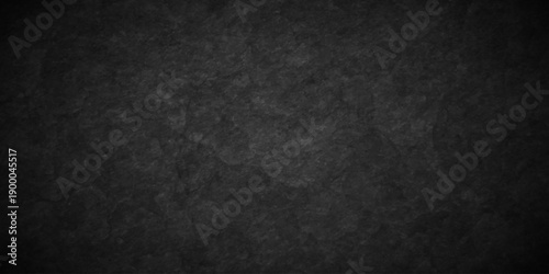 Distressed Rough Black wall slate texture. grunge wall backdrop rock blank background. dark concrete floor old background. black paper concrete grunge limestone texture.