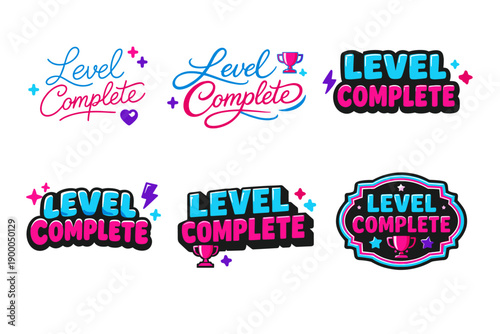 Level complete designs with decorative typography and trophy graphics