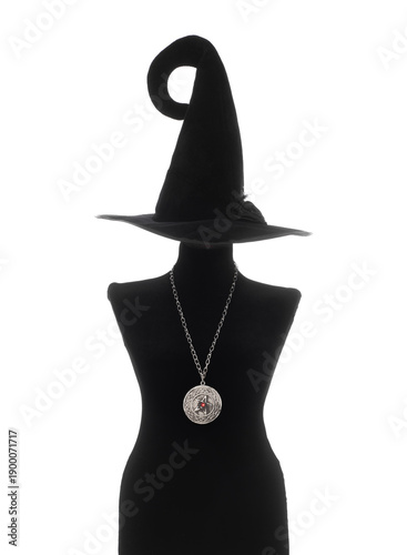 Black silhouette of a witch in a hat isolated on a white background