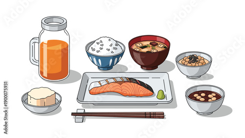 Comprehensive Japanese breakfast set with grilled salmon, white rice, miso soup, natto, and various side dishes on a table.