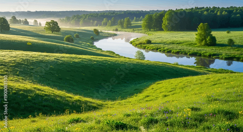 Gentle green hills meet a tranquil river under a soft morning sky