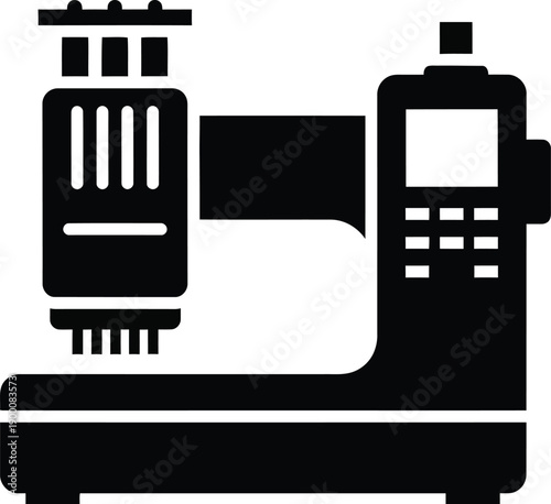 A black silhouette icon representing an industrial sewing machine or embroidery equipment.