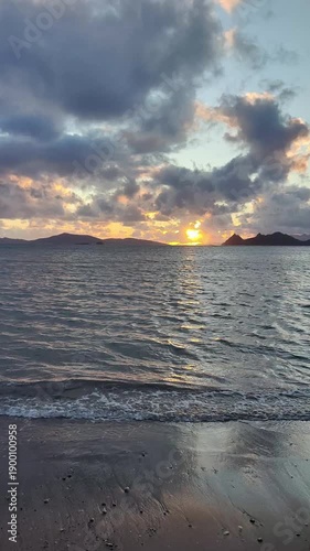 Magnificent sunset on a cloudy day over the Aegean Sea in autumn. vertical video for social media.	
