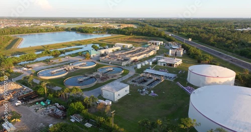 Aerial view of water treatment factory at city wastewater cleaning facility. Purification process of removing undesirable chemicals, suspended solids and gases from contaminated liquid.