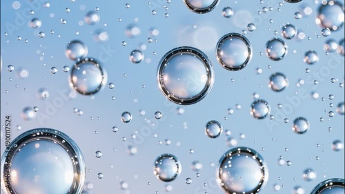 Video of water gel drops and bubbles slowly floating in the air creating an atmosphere of freshness and vitality for skin products.Slow motion.AI Generative.