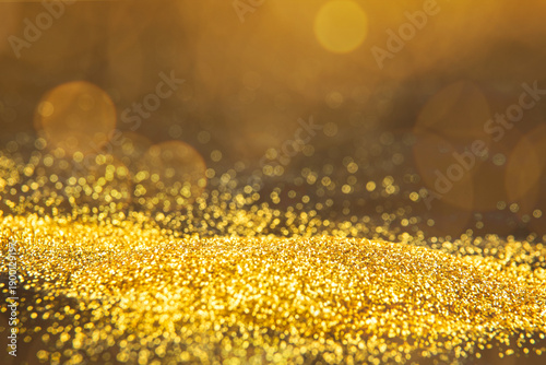 Fotografía Gold glitter shines in bright light