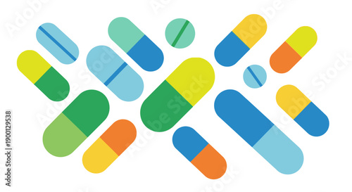 Colorful pills and capsules scattered on a white background.