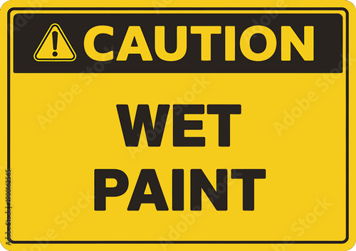 Caution wet paint warning sign with yellow and black colors