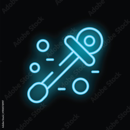 Blue neon icon of a baby rattle glowing on a dark background