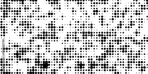 Abstract pop art halftone and seamless vintage distressed small dot background pattern, black and white abstract image displaying a dense randomized pattern of small circular dots across the design.