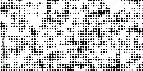 Abstract pop art halftone and seamless vintage distressed small dot background pattern, black and white abstract image displaying a dense randomized pattern of small circular dots across the design.
