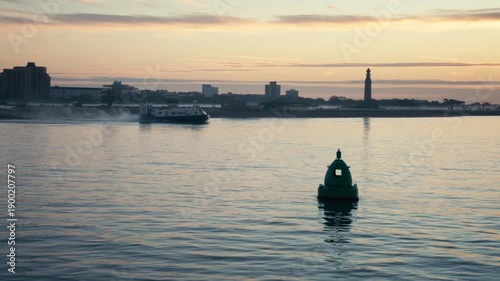 Riding on a boat in Portsmouth, UK at sunrise