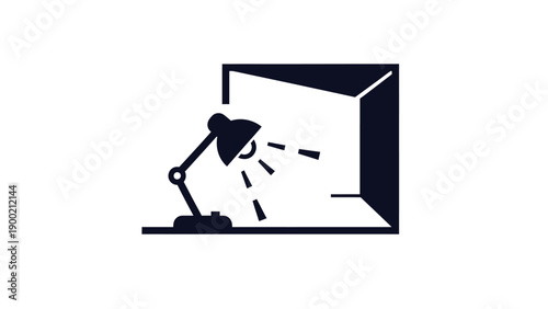 A black, minimalist depiction of a desk lamp, light emanating, illuminating a box corner