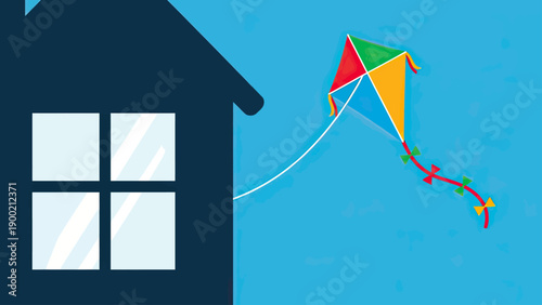 A colorful kite flies near a house silhouette against a bright blue sky
