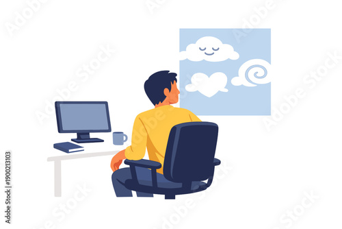 Man sits at desk and looks out window at clouds during day while working on computer in home office setting