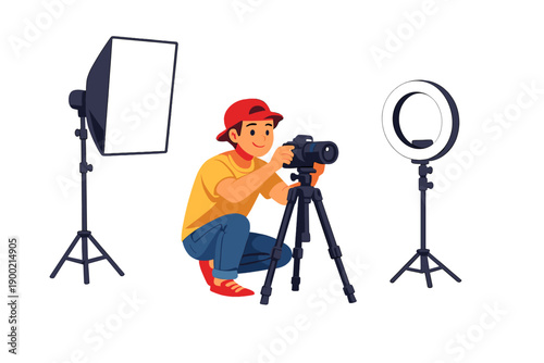 Young person takes pictures with a camera using a tripod and lighting setup in a studio environment during daytime