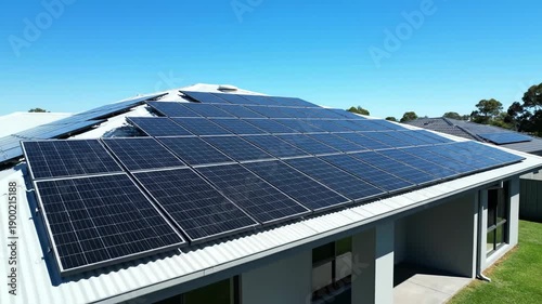 Wallpaper Mural Solar panels on roof under clear blue sky, clean energy renewable source. Environmentally friendly technology, sustainable resources, alternative power. Torontodigital.ca