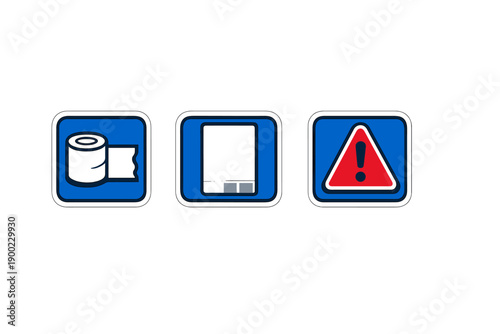 Signs showing toilet paper, hand dryer, and warning symbol in a public restroom setting for clear communication of facilities and alerts