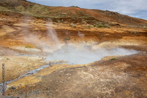 Photos Steaming mud pot hot spring at Seltun geothermal area in Krysuvik, Reykjanes, Ic