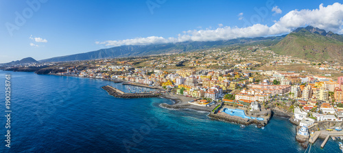 Candelaria town and coastline on Tenerife, Canary Islands with mountains in the background.