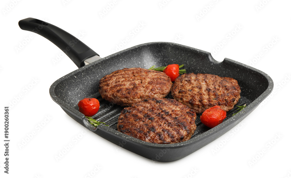 Fototapeta premium Delicious grilled meat patties, tomatoes and rosemary in grill pan isolated on white, top view