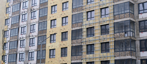 Bild auf Leinwand Urban construction site building facade with insulation material and metal frame