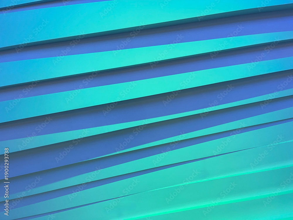 Obraz premium Abstract blue geometric stripes background with 3D shadow effect. Modern teal and cyan linear pattern for creative minimalist design, wall texture, and contemporary digital art wallpaper