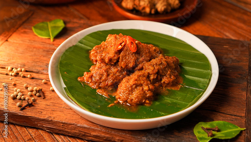 A plate of food with a leaf on top of it