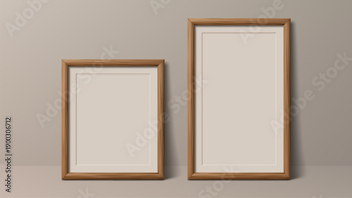 Two empty wooden picture frames with blank paper inside, standing on a shelf. Mockup for presentation of art, photograph, or poster. Minimalist and modern interior design.