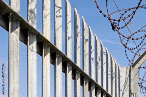 Industrial Metal Fence with Razor Wire and Security Barrier