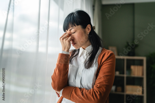 Konstfotografi Woman experiencing headache and stress feeling tired and fatigued