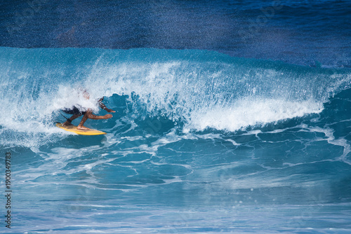 Bild auf Leinwand Surfer getting barrelled at Hookipa on Maui.