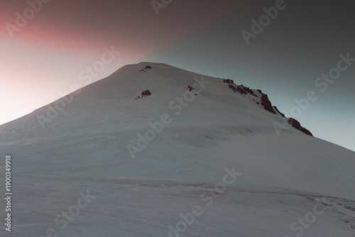 Panorama of caucasian Kazbegi mountain and architecture of ancient Georgia. drama sky, mountain peaks, high resolution photo.